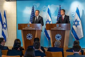 U.S. Secretary of State Antony Blinken and Israeli Foreign Minister Eli Cohen address reporters at a joint press conference at the Israeli Ministry of Foreign Affairs. As Israeli and U.S. flags stand behind them, the diplomatic backdrop underscores growing international interest, coinciding with Israel’s booming cybersecurity sector, which secured $1.5 billion in Q2 2025 funding.